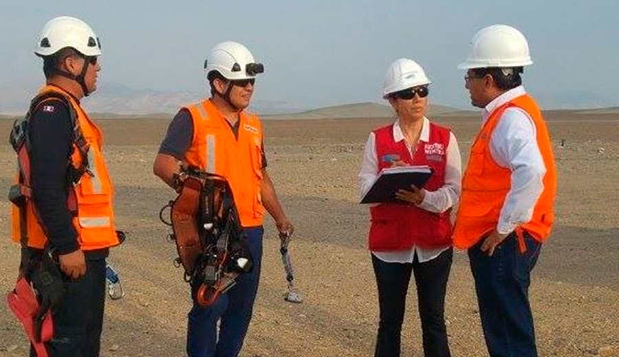 Boss introducing black new worker to workmates